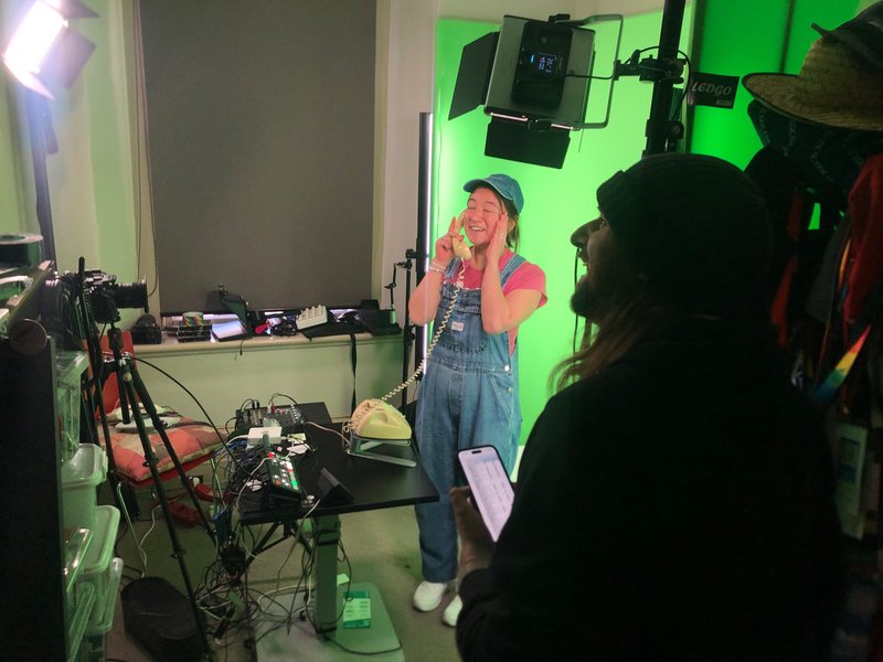 Cast member cracking up between takes