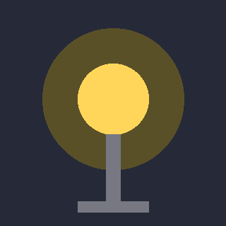 A lit lamp on a post