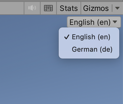 The top right of Unity's Game view, with a locale menu open, showing English (en) selected and German (de)